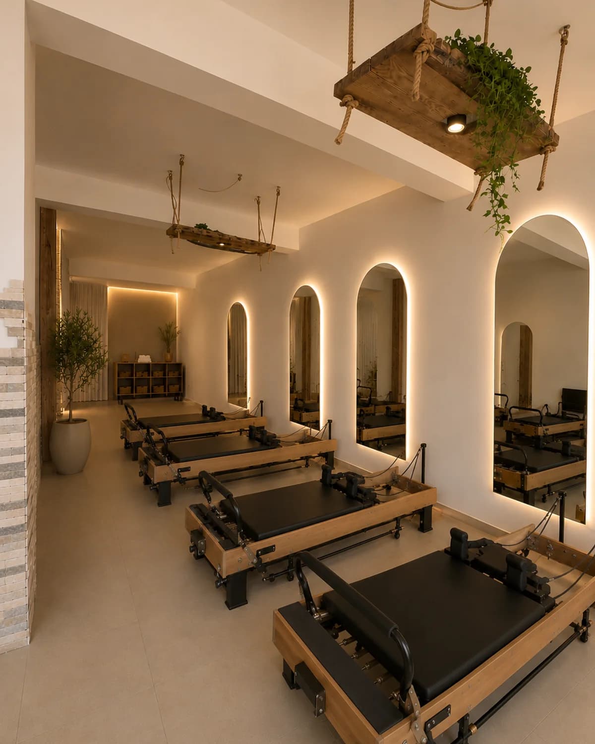 corehouse Pilates studio with reformer equipment and warm natural light