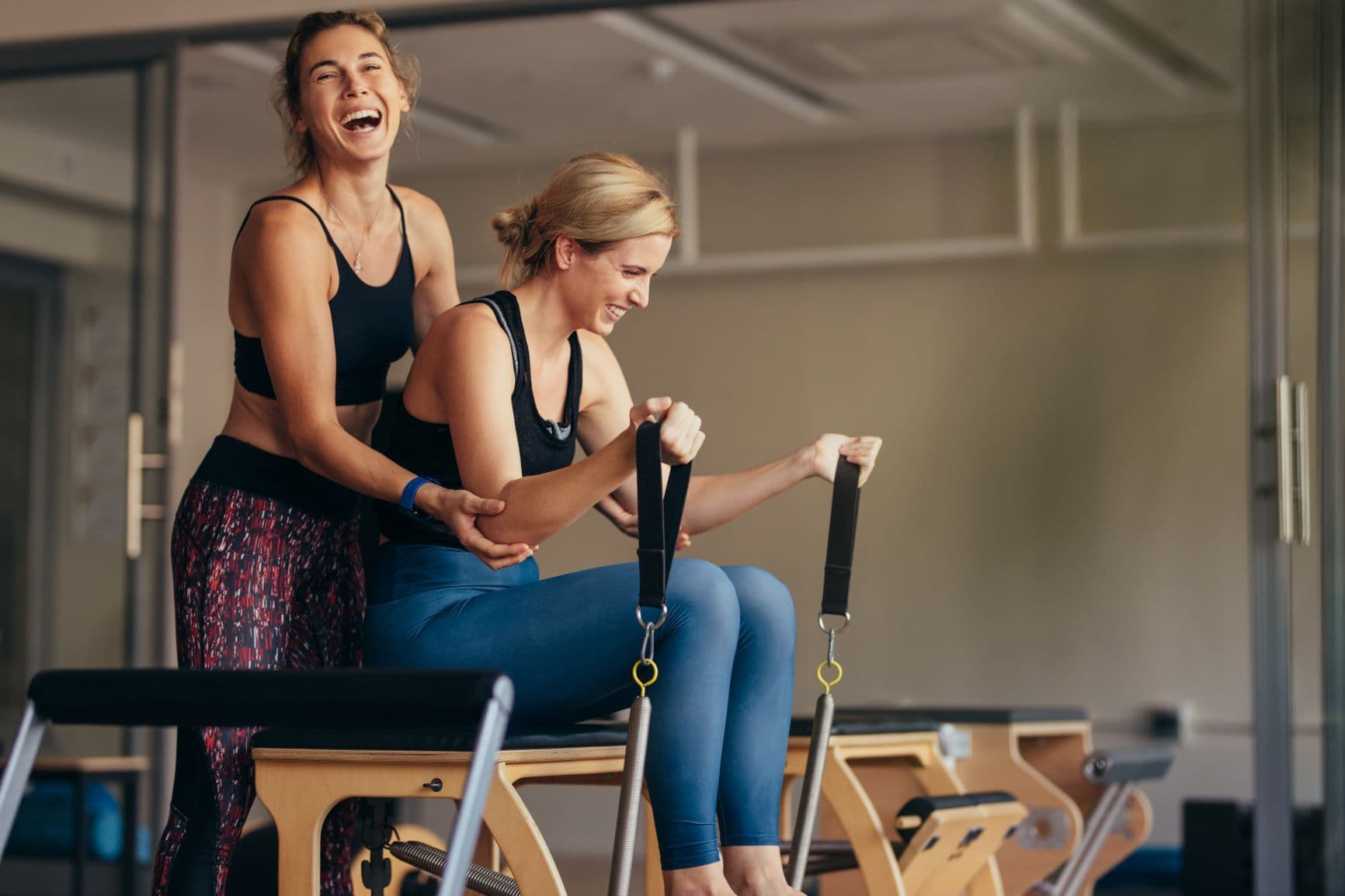 Instructors supporting clients in the corehouse studio